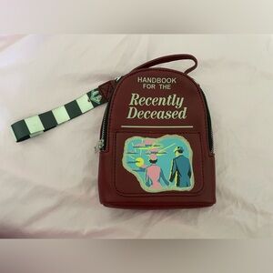 Handbook for the Recently Deceased purse